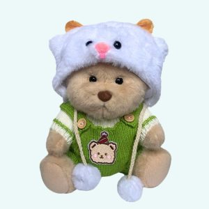 Nino – L’orso di peluche articolato fatto a mano con tutina lavorata a maglia verde